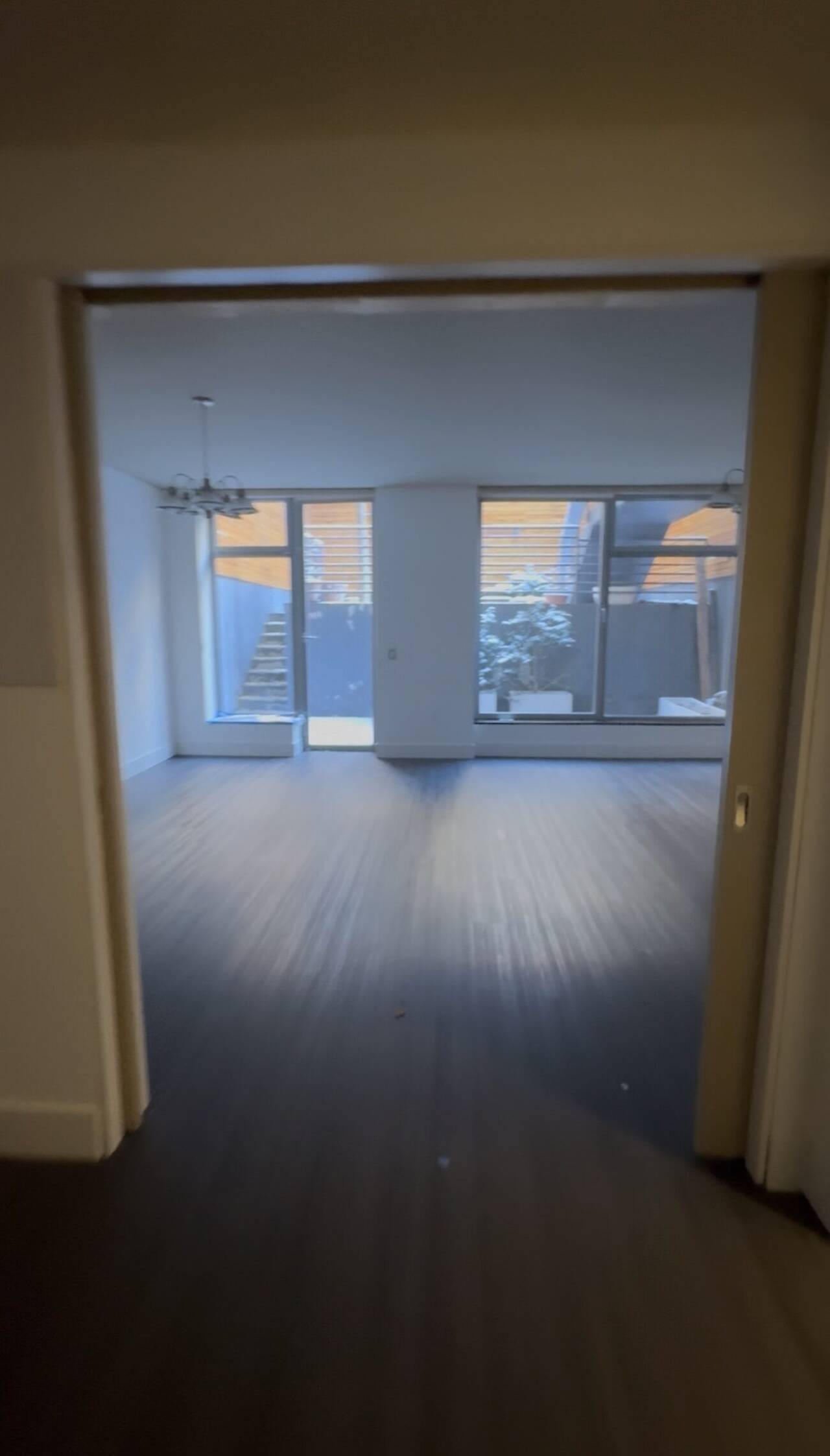 Refinished hardwood flooring in a New York City apartment by Fuenmayor Solutions LLC